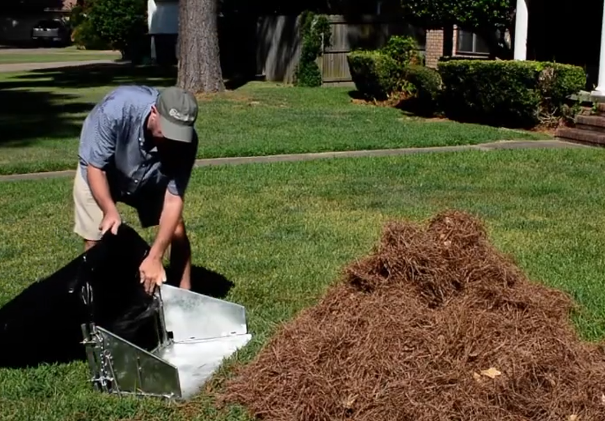 A man installing the My Ultimate Bagger product.